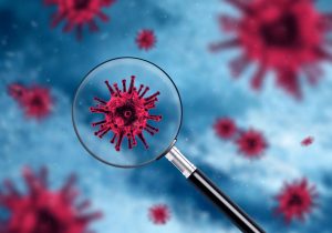 Magnifying glass showing red virus bacteria, 3d microscopic microorganism background, modern biotechnology concept